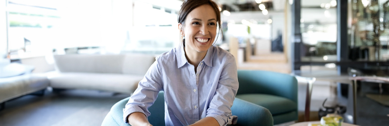 career-woman-smiling-web-1600x522.webp