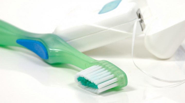 close-up-of-toothbrush-and-floss-e1453761086566.jpg